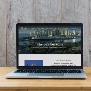 Laptop with One Biscayne Tower website